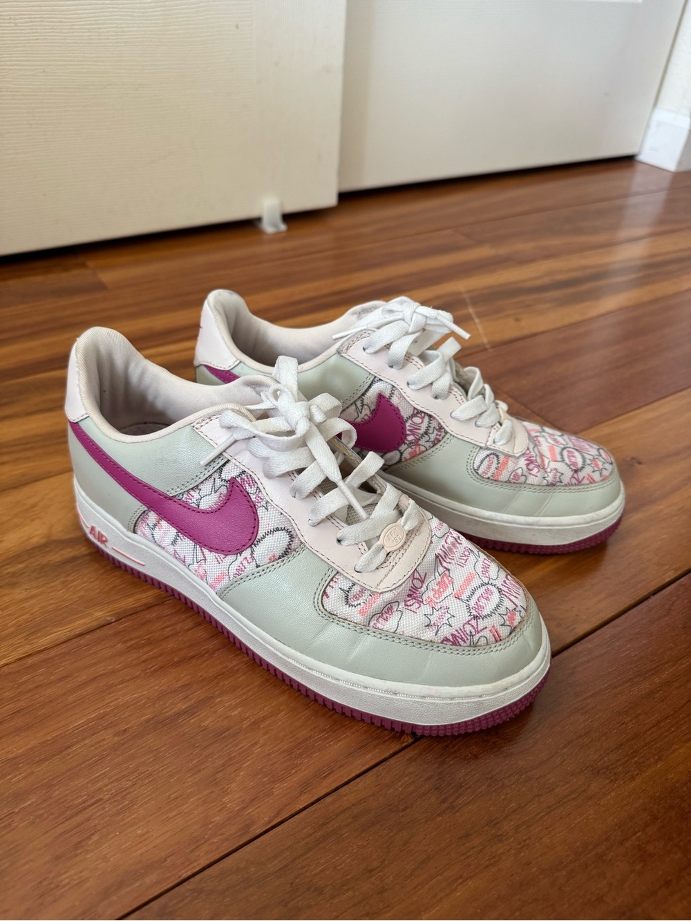 Nike Low-Top Air Forces — White & Pink Patterned Swoosh